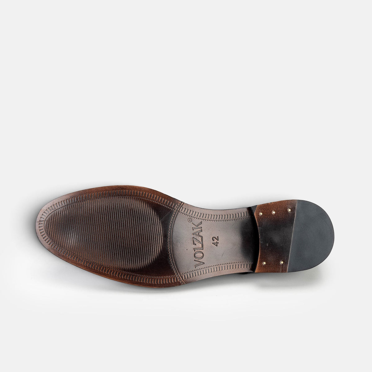 VOLZAK vintage brown leather shoe sole with textured grip and branded heel detail